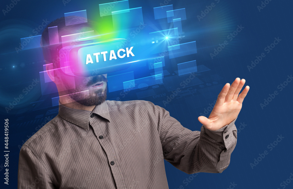 Businessman looking through Virtual Reality glasses Businessman looking through Virtual Reality glasses