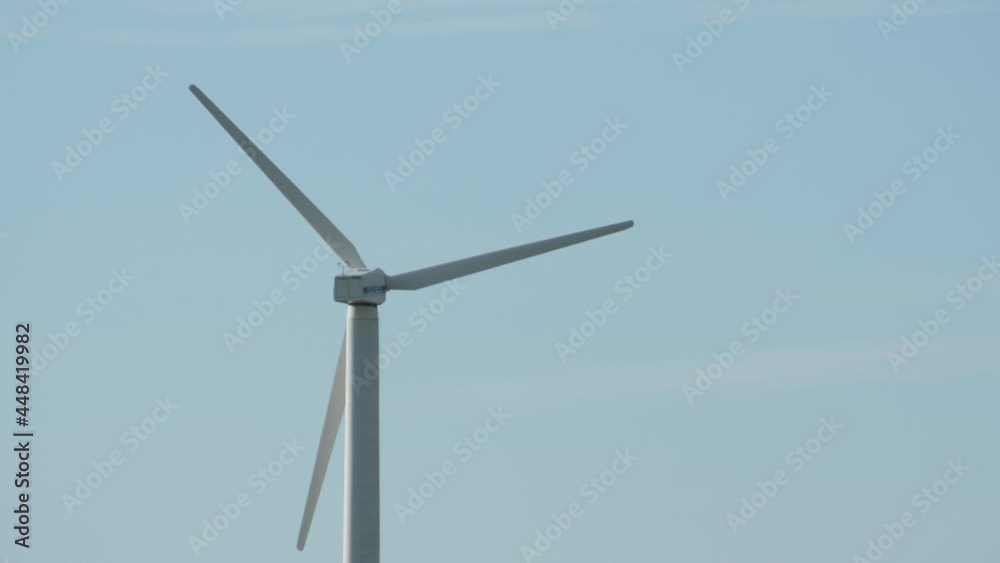 Windmills generate electricity. Green energy from the wind. Electricity from wind. Independent energy from nature Windmills generate electricity. Green energy from the wind. Electricity from wind. Independent energy from nature