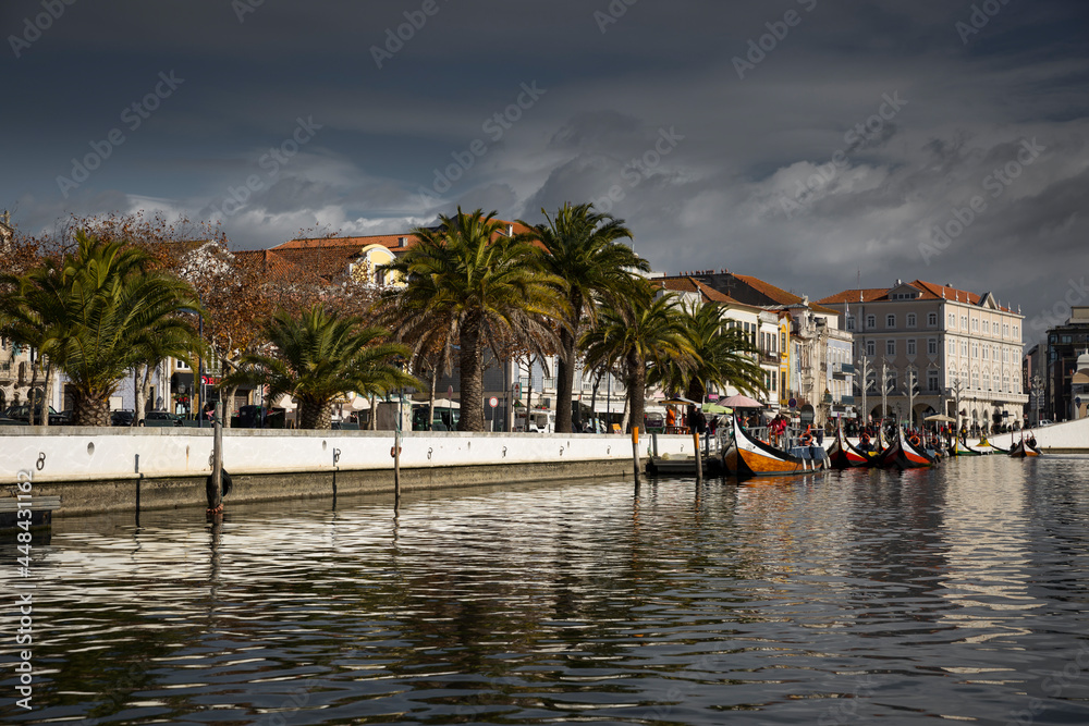 view of a canal in Aveiro city and its colorful boats (barcos moliceiros), Aveiro, Portugal