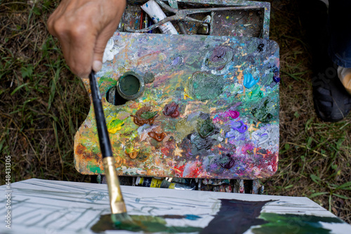 Photo the artist's palette with oil paints Fotobehang