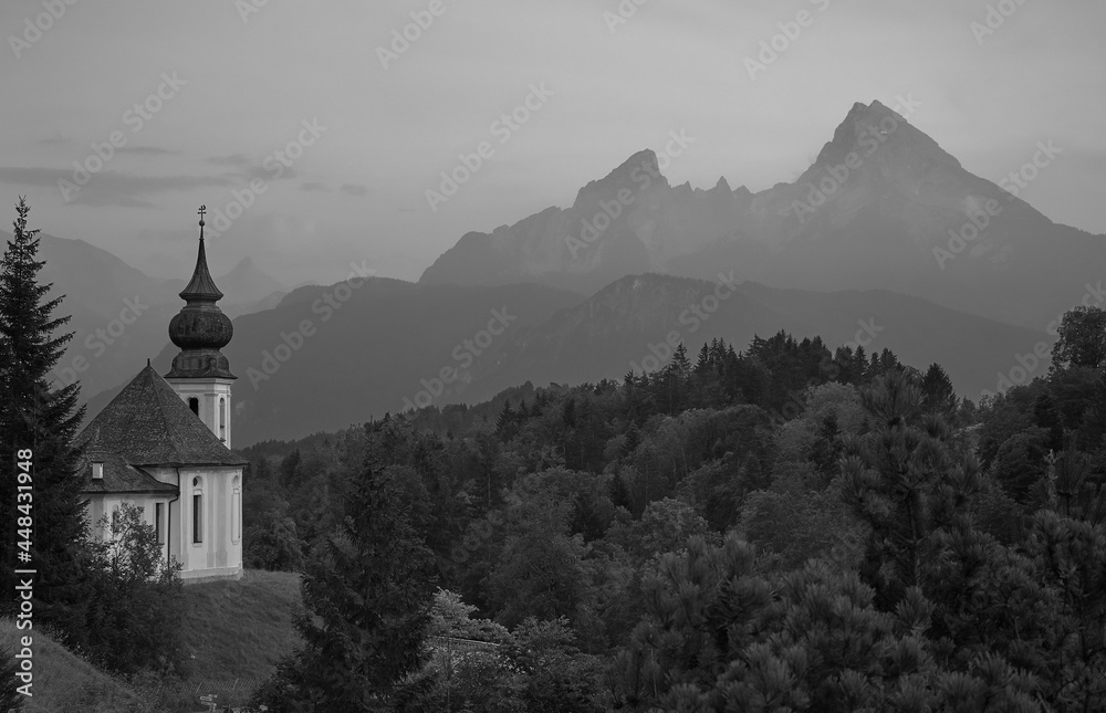 Church of Maria Gern in the Berchtesgaden Alps with Watzmann mountain in the background.