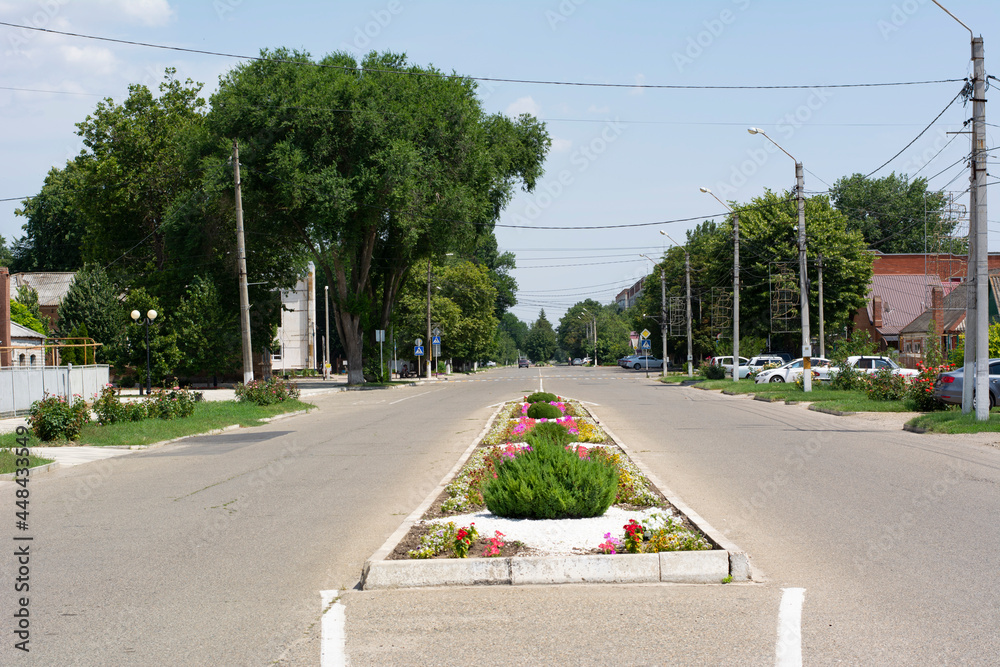 The central street of the city of Primorsko-Akhtarsk in the Krasnodar Territory in the Kuban in Russia on a summer day.