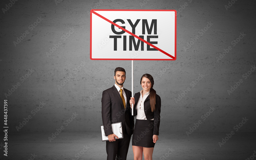 business person holding a traffic sign business person holding a traffic sign