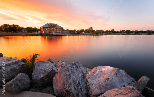 Beautiful sunset of Seneca Lake and Finger Lakes Welcome Center in Finger Lakes region of upstate of New York, Geneva NY USA photo
