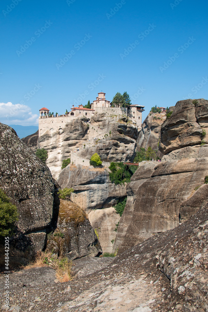 Monasteries built on cliffs, Meteora on a hot summer day, Greece
