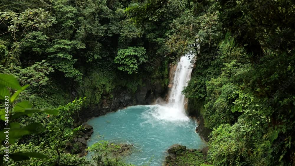 Rio celeste waterfall in the middle of a tropical rainforest Tenorio national park Costa Rica Rio celeste waterfall in the middle of a tropical rainforest Tenorio national park Costa Rica