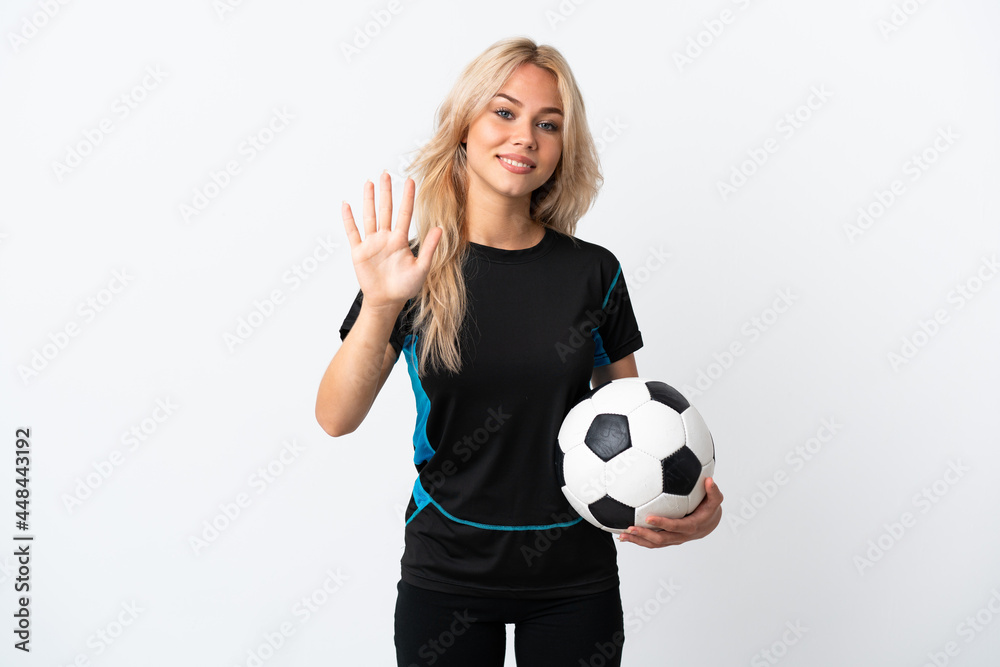 Young Russian woman playing football isolated on white background counting five with fingers Young Russian woman playing football isolated on white background counting five with fingers