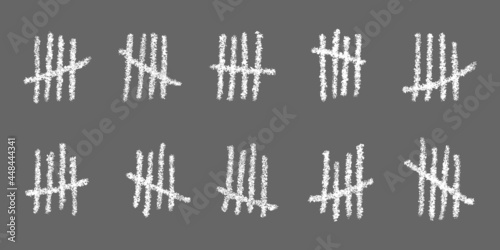 White tally marks on gray background. Chalk drawn sticks sorted by four and crossed out by slash line. Counting stripes on chalkboard. Unary numeral system signs. Vector illustration