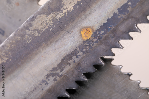 Old vintage metal hacksaw blade close up. Background for craftsmanship and manual labor.