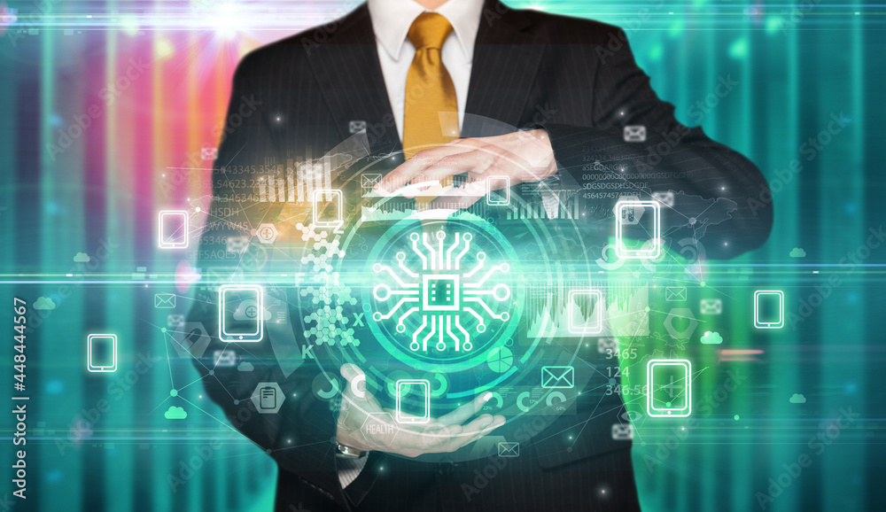 Businessman holding technology icon concept Businessman holding technology icon concept