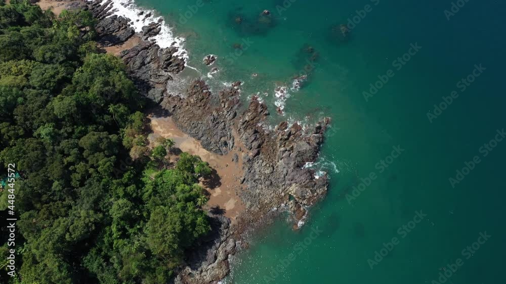 Jungle rocky and sandy shore clear blue water top drone view Costa Rica Corcovado Jungle rocky and sandy shore clear blue water top drone view Costa Rica Corcovado