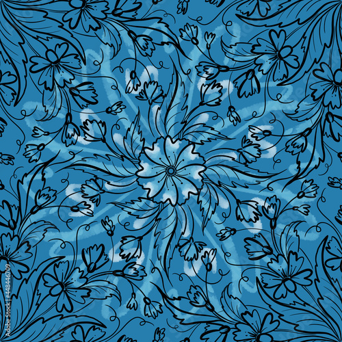 Flower mandala tile on blue background seamless pattern photo