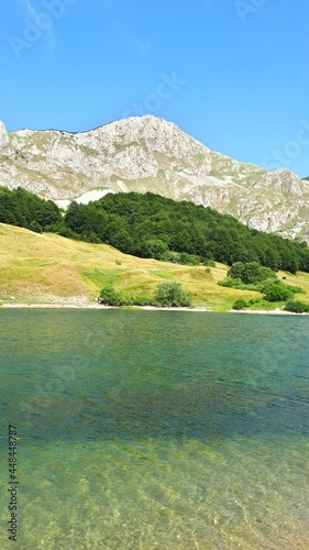 Mountain panorama with Orlovacko lake, forest and peaks above it on mountain Zelengora, Bosnia and Herzegovina