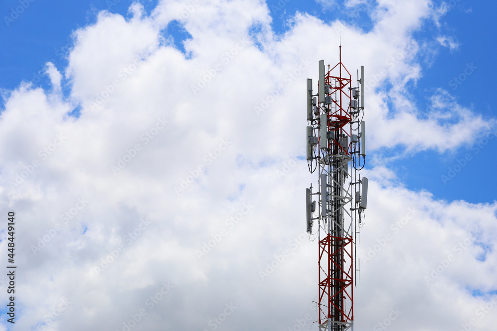 Telephone tower on cloud background.