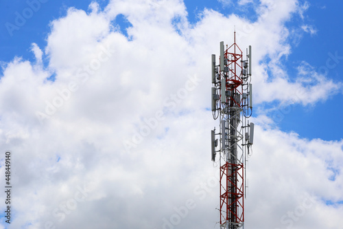Telephone tower on cloud background.