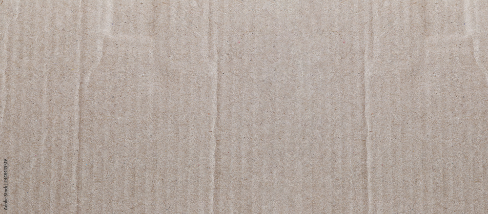 Fototapeta premium Wide brown paper box or cardboard.