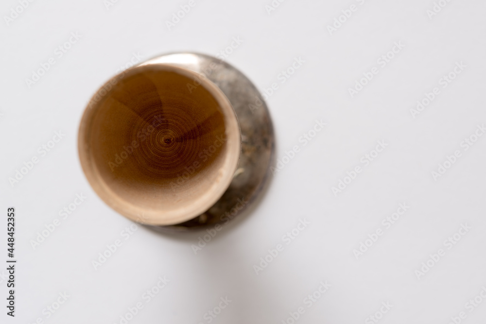 isolated wooden object-cup with metal ring on white isolated wooden object-cup with metal ring on white