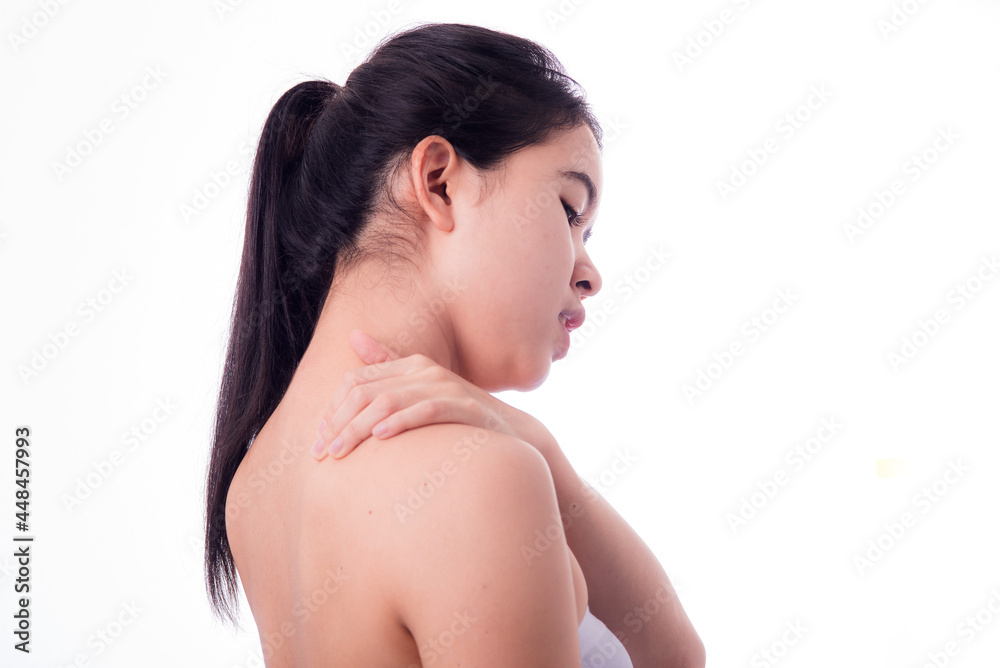 Asian woman with shoulder pain. woman is enduring awful ache. shoulder pain from sports. Young lady with shoulder pain Asian woman with shoulder pain. woman is enduring awful ache. shoulder pain from sports. Young lady with shoulder pain