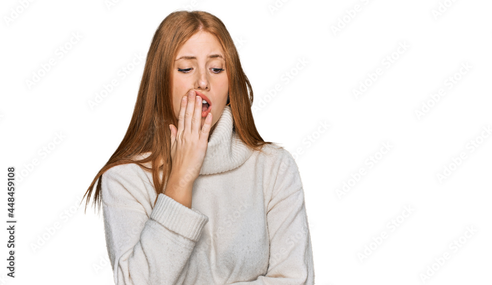 Young irish woman wearing casual winter sweater bored yawning tired covering mouth with hand. restless and sleepiness. Young irish woman wearing casual winter sweater bored yawning tired covering mouth with hand. restless and sleepiness.