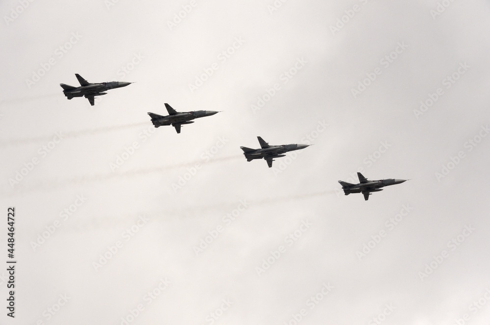 Modernized front-line bombers with a variable sweep wing Su-24M in the sky over Moscow's Red Square during the Victory Air Parade Modernized front-line bombers with a variable sweep wing Su-24M in the sky over Moscow's Red Square during the Victory Air Parade