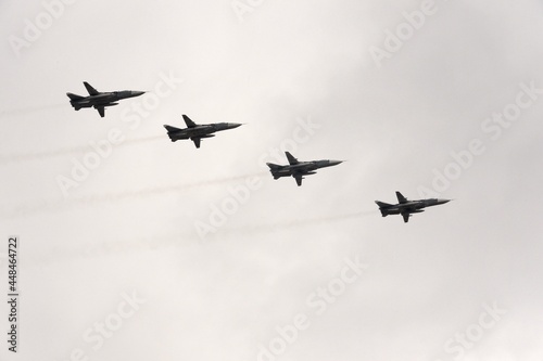 Modernized front-line bombers with a variable sweep wing Su-24M in the sky over Moscow's Red Square during the Victory Air Parade