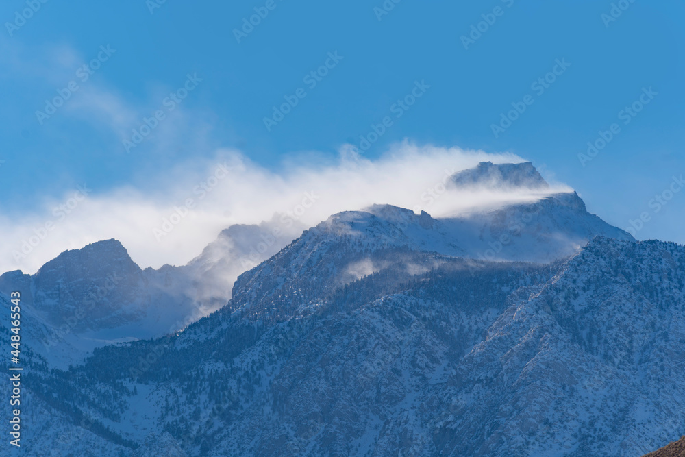 Snow and Wind on mountain peaks, Lone Pine Desert, California