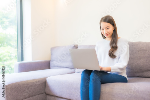 Portrait beautiful young asian woman use laptop for working