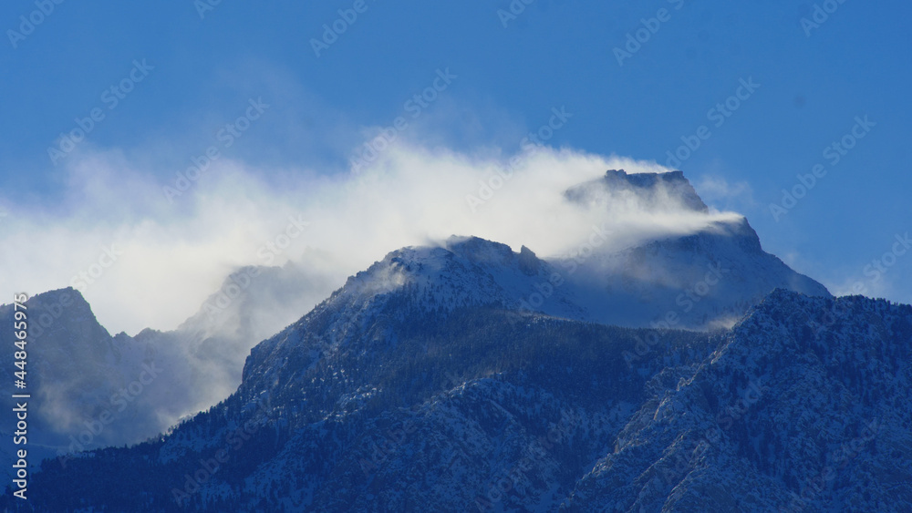 Snow and Wind on mountain peaks, Lone Pine Desert, California