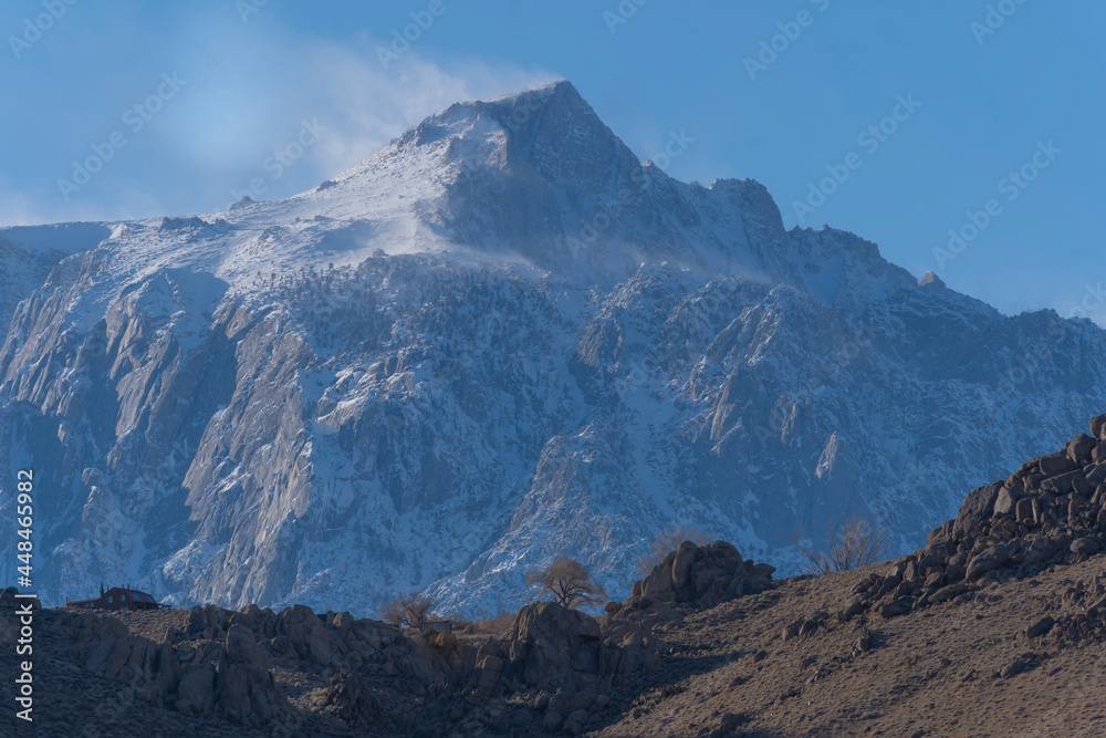 Snow and Wind on mountain peaks, Lone Pine Desert, California