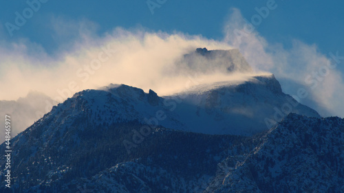 Snow and Wind on mountain peaks, Lone Pine Desert, California © Neil