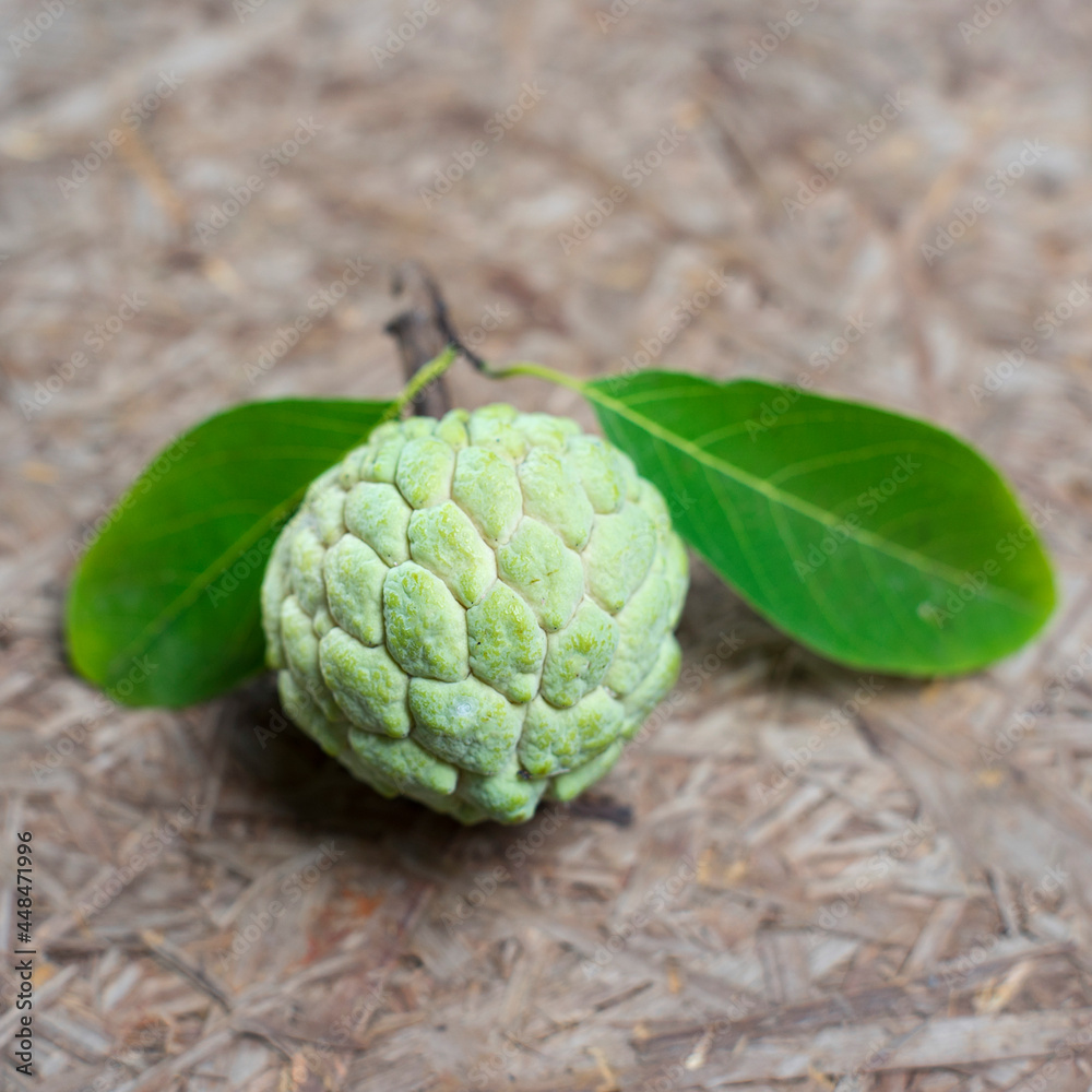 Fresh custard apple on wooden background Fresh custard apple on wooden background