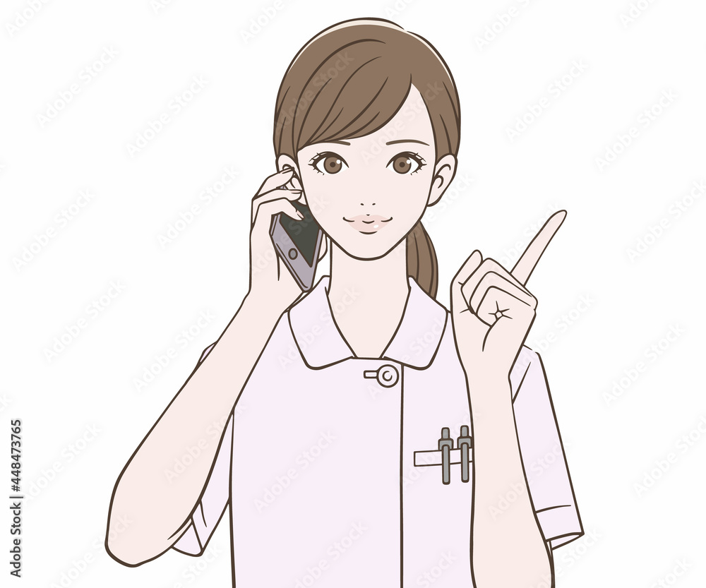 スマートフォンを持ち、人差し指を立てる看護師