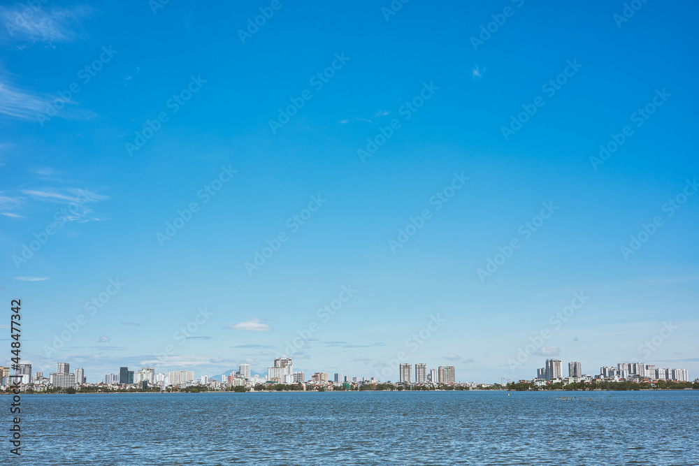 A lake view in the city on daytime