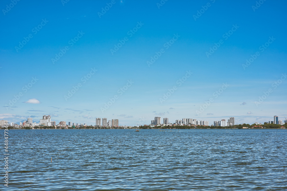 A lake view in the city on daytime