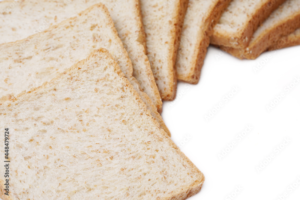 Fresh delicious whole wheat bread isolated on a white background. Fresh delicious whole wheat bread isolated on a white background.