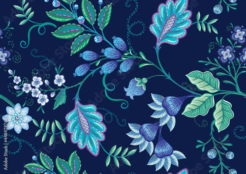 Seamless pattern with stylized ornamental flowers in retro, vintage style. Jacobin embroidery. Colored vector illustration on navy blue background.