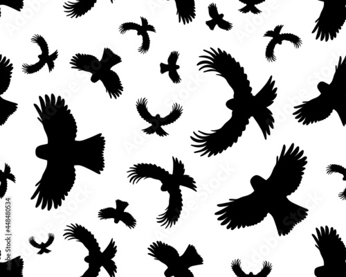 Black silhouettes of birds in flight, seamless