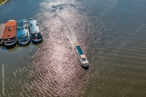 Pleasure boat in the Ob Sea. Berd Bay, Novosibirsk region photo