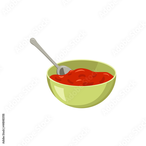 Red tomato paste in a bowl with a spoon. Sauce or seasoning for food and snacks. A healthy source of vitamins