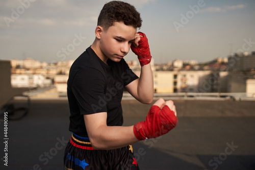 Kickbox fighter training in urban environment © Xalanx