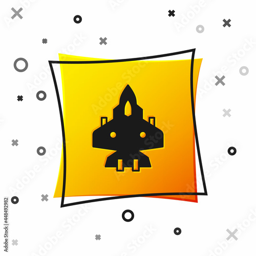 Black Jet fighter icon isolated on white background. Military aircraft. Yellow square button. Vector