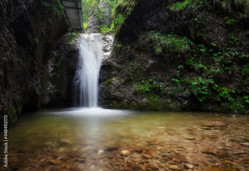 Waterfall in green valley - Janosikove diery, Small Fatras, Slovakia photo