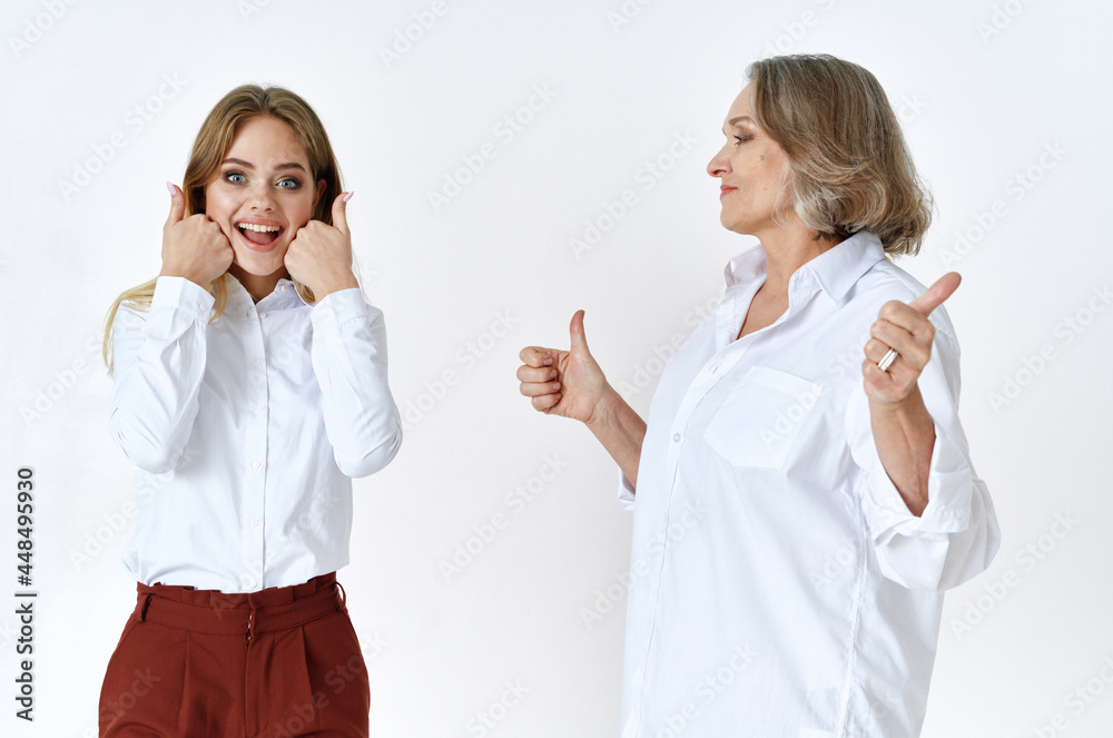 cheerful mom and daughter in white shirts embrace lifestyle cheerful mom and daughter in white shirts embrace lifestyle
