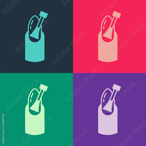 Pop art Nail manicure icon isolated on color background. Vector