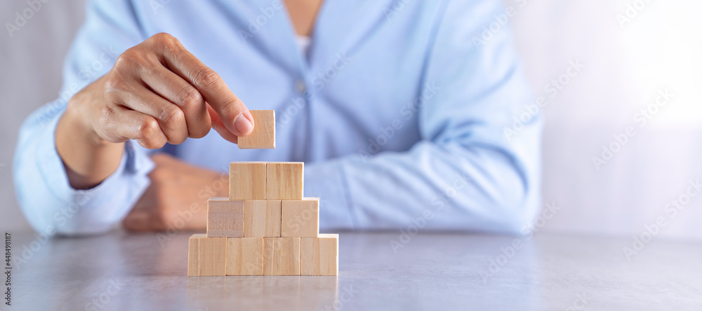hand stack woods block step on table. business development concept.copy space. hand stack woods block step on table. business development concept.copy space.