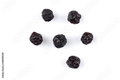 Dried blueberries on white background