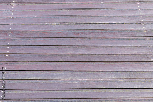 Photography Dark brown weathered decking, horizontal boards