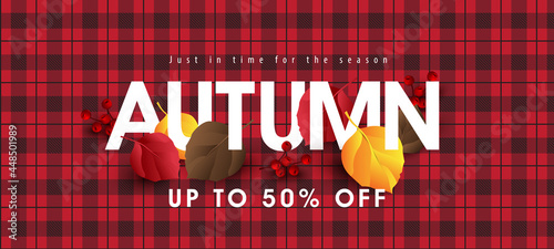 Autumn sale banner background layout decorate with autumn leaves on red plaid fabric pattern