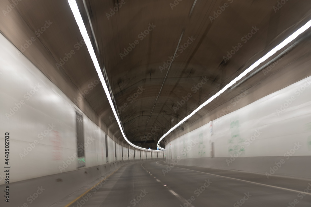 modern underground tunnel with gray road tunnel of motion car, road tunnel