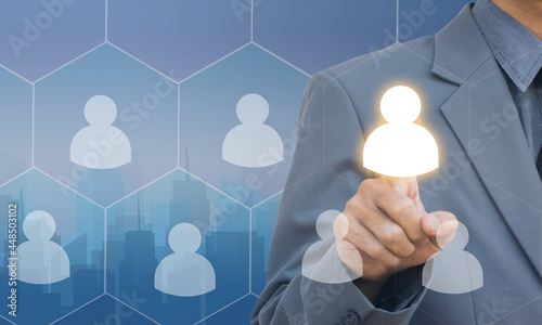 Business man black suit select Choice employee human resource system technology. hold idea lamp lifgt concept idea.